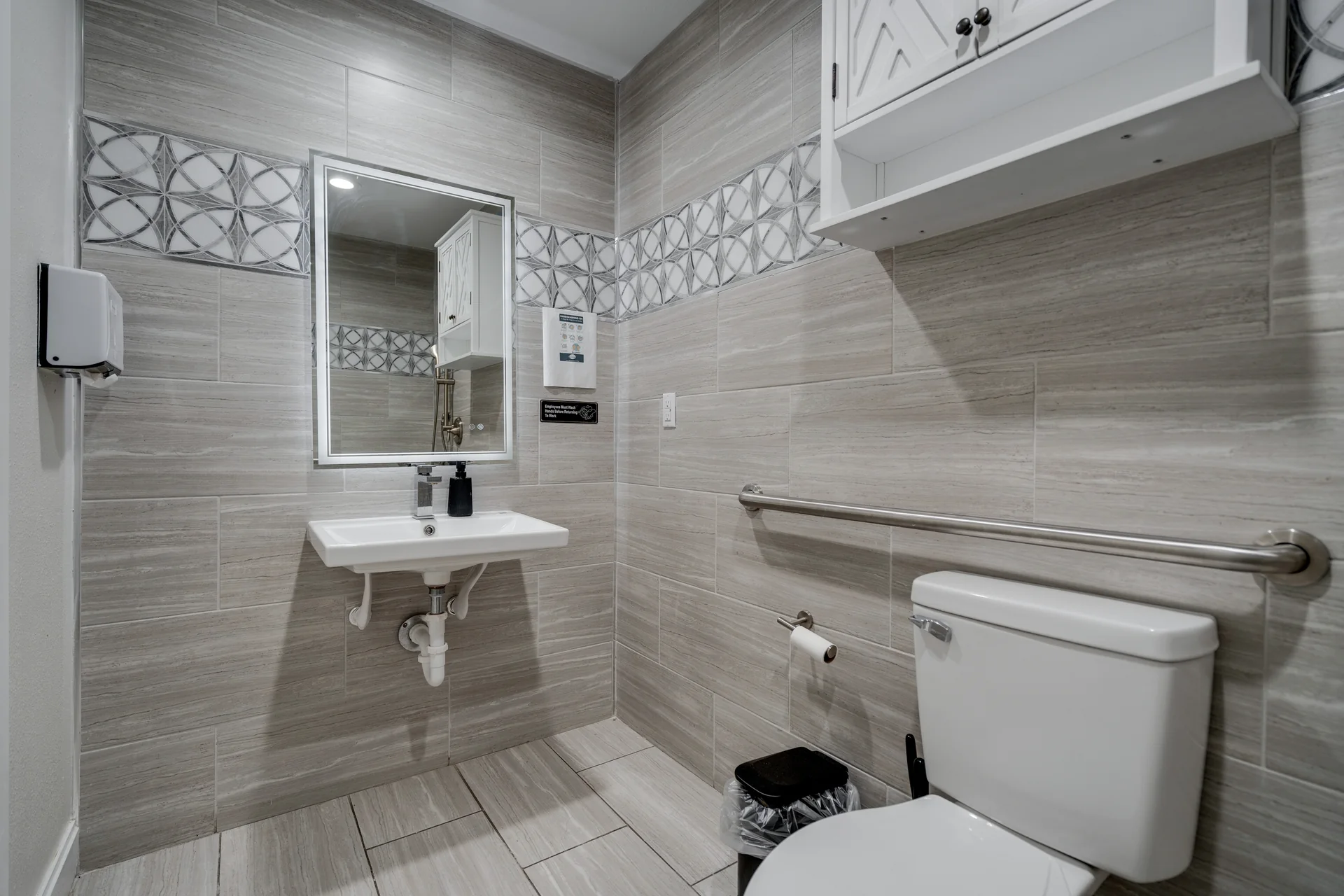 Bathroom with a shower and grab bars at Willow Creek